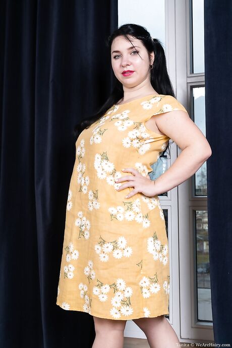 Curvaceous bombshell Tanita pounds her very hairy pussy with a dildo