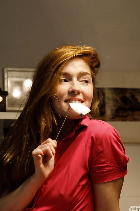 Redheaded Russian teen Jia Lissa strips & poses while having a cup of tea